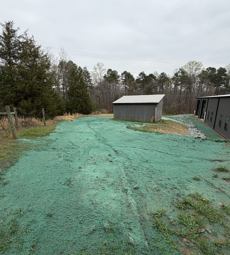 Subdivision road shoulders hydroseeded for a residential builder