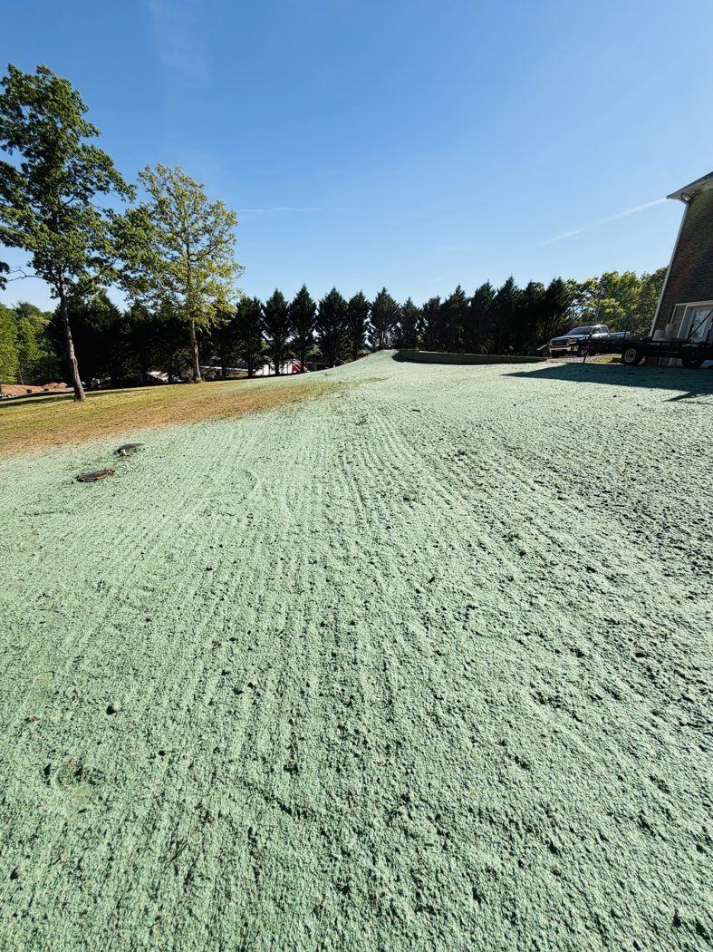 Commercial slope stabilized with Bonded Fiber Matrix by TerraSeed