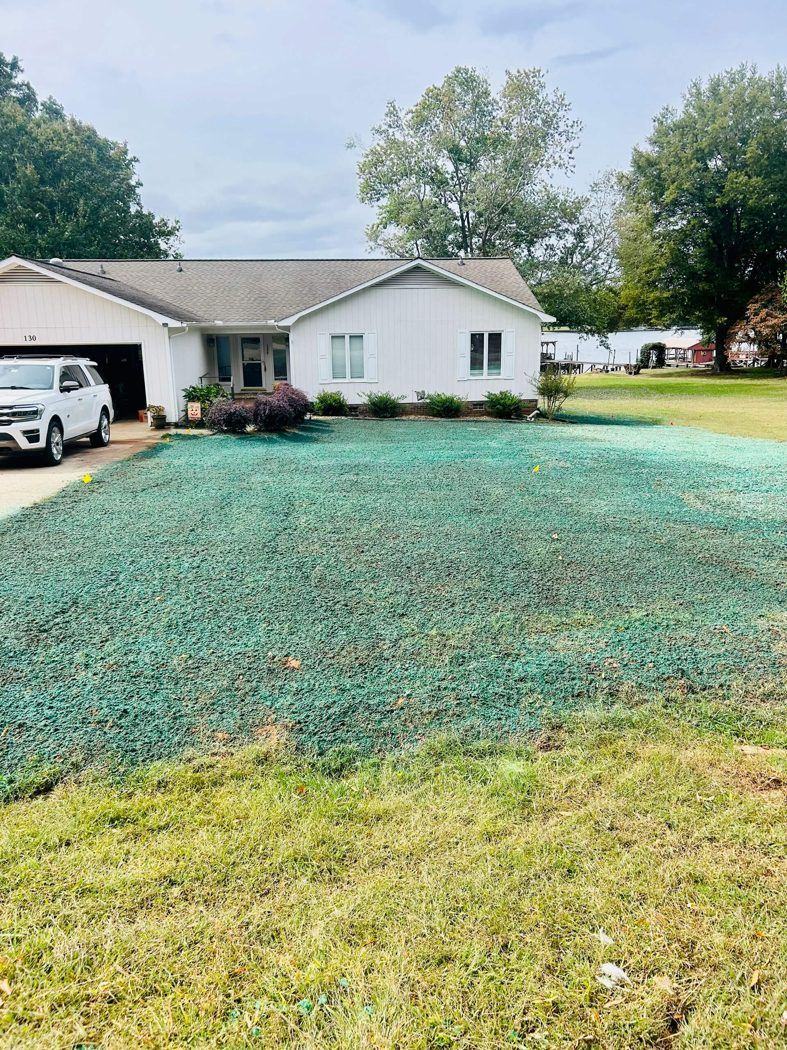 Lakefront home with new hydroseeded lawn in Mooresville NC