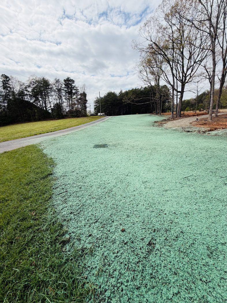 Wide rural backyard hydroseed, Carolina Piedmont
